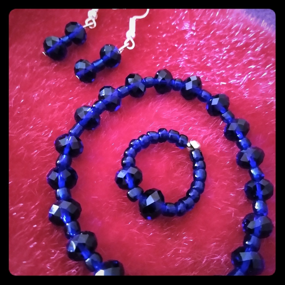 A set of beautiful earrings, a ring and bracelet.